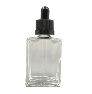 El cosmético de cristal del cuadrado 30ml embotella el casquillo a prueba de niños del dropper para el aceite del cuidado del cabello