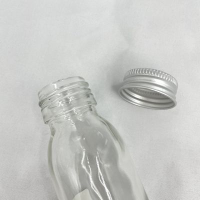 No derrame la botella de cristal de empaquetado cosmética 60ml del cuidado de piel con el casquillo de aluminio