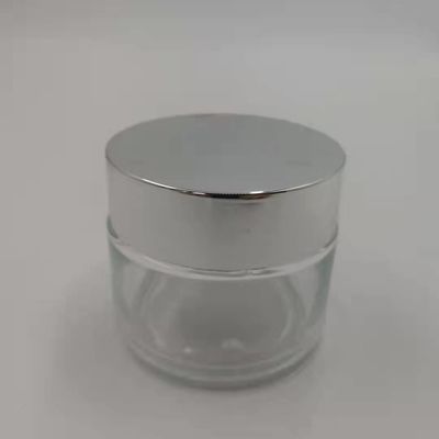 Tarro de la crema del vidrio del claro 100g de MSDS con el fango blanco de la máscara de la tapa del casquillo de plata brillante