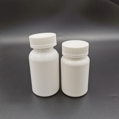 los niños blancos de la botella del HDPE 120cc impermeabilizan el casquillo empujan hacia abajo y dan vuelta para abrirse